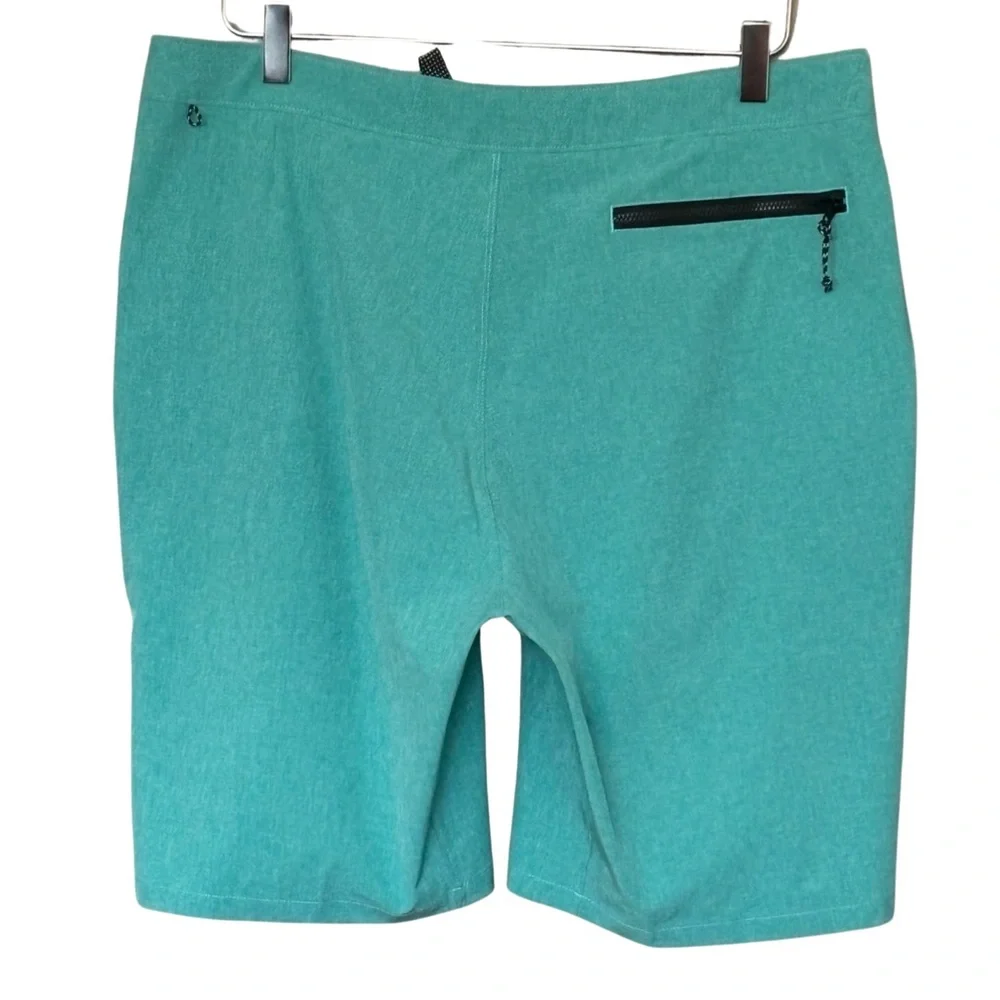 NIKE: Four Way Stretch Swim Trunks in Green